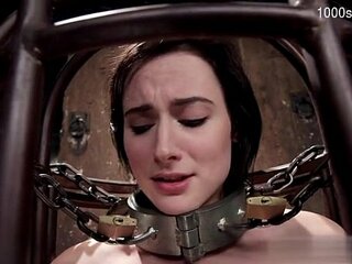 Young woman in bondage submits to hard double penetration